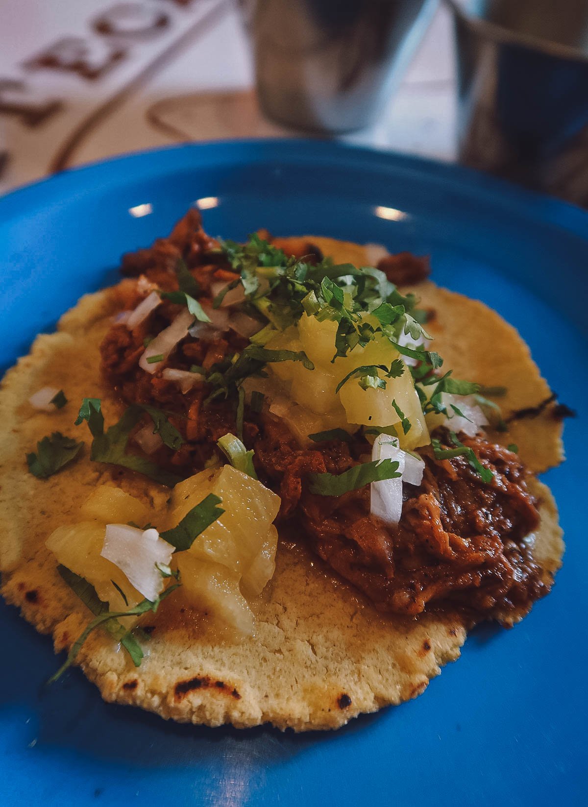 Pork belly al pastor taco from a restaurant in Merida, Mexico
