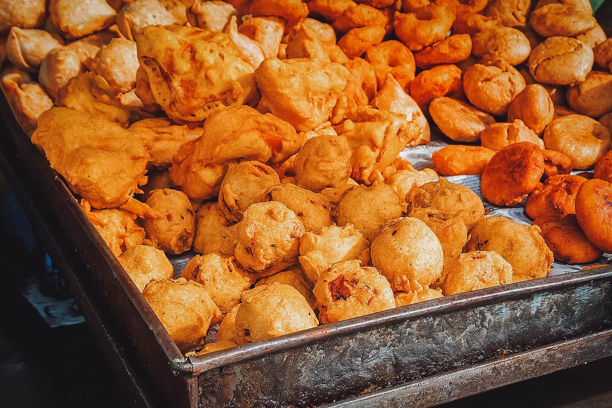 Bin with gulgule donuts