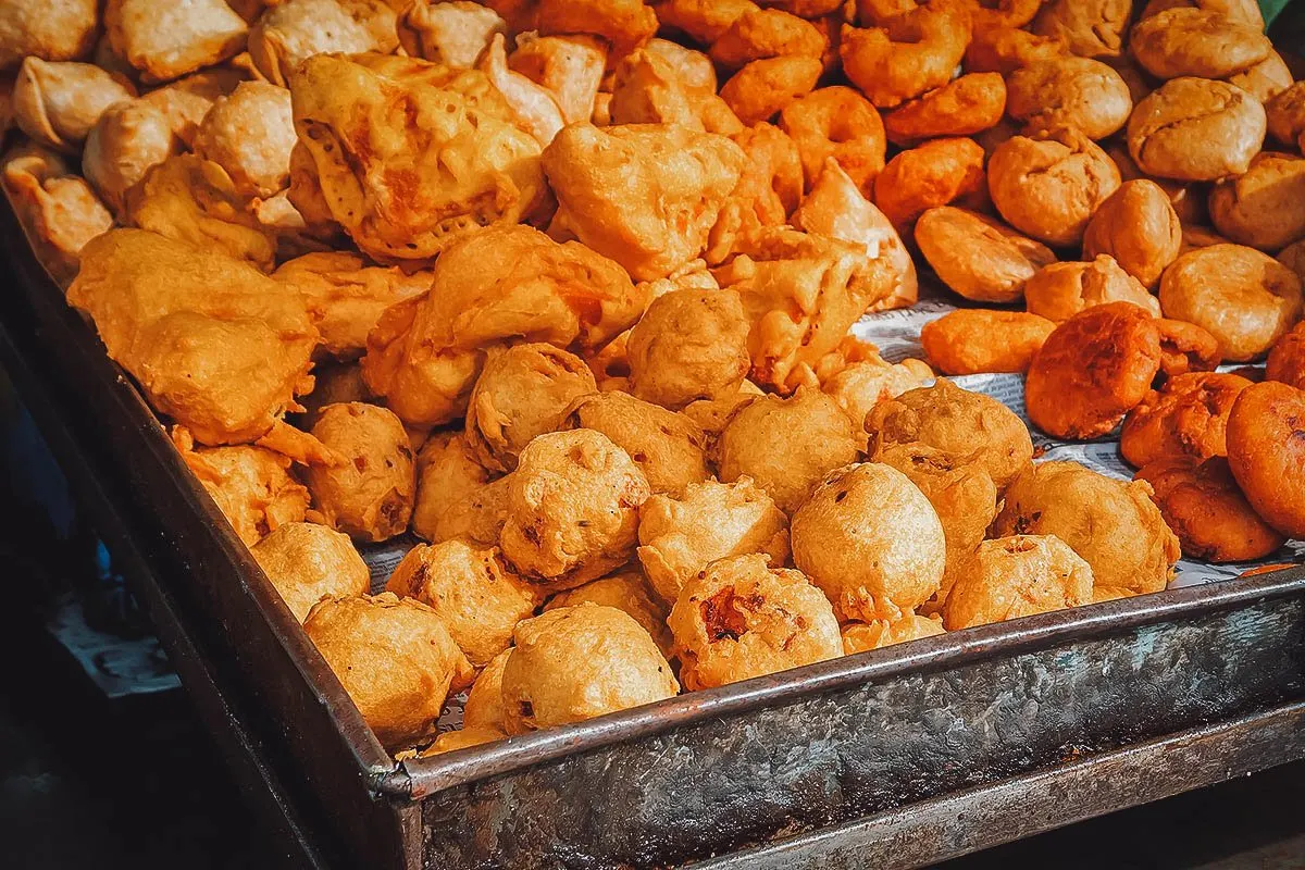 Bin with gulgule donuts