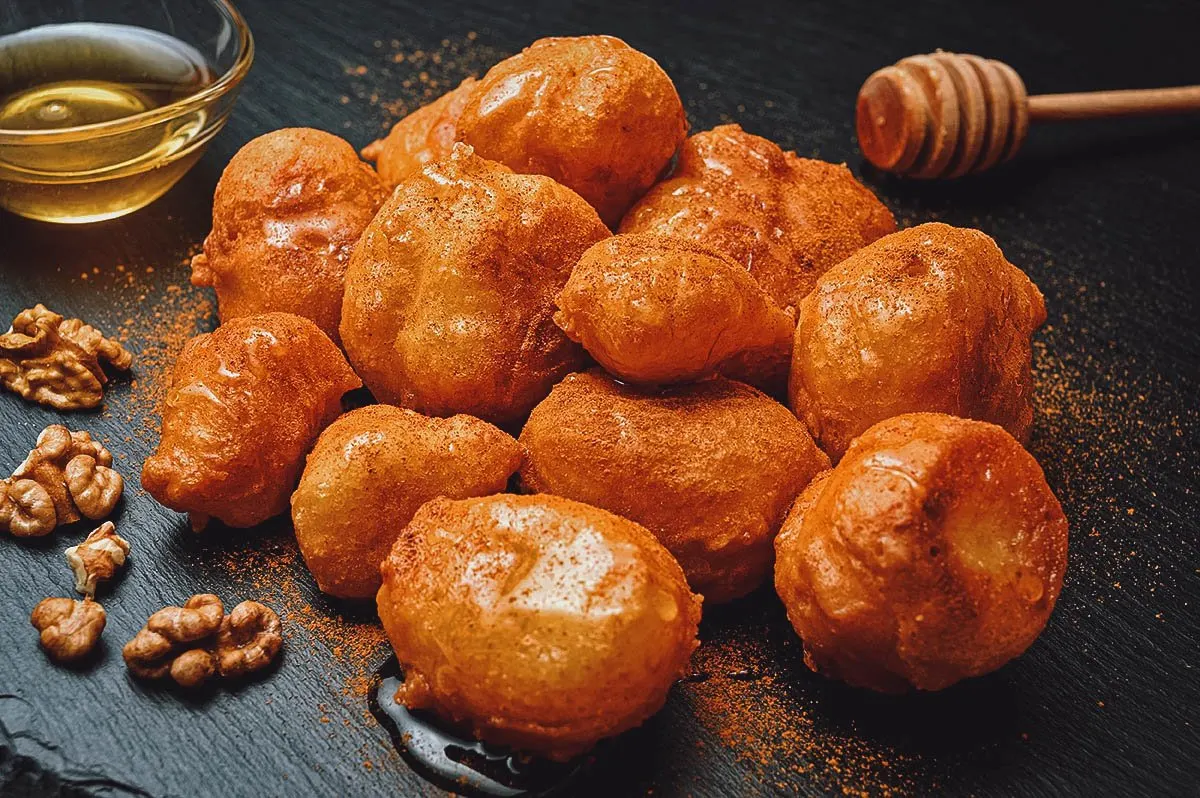 Types of Donuts From Around the World Loukoumades donuts drizzled with honey