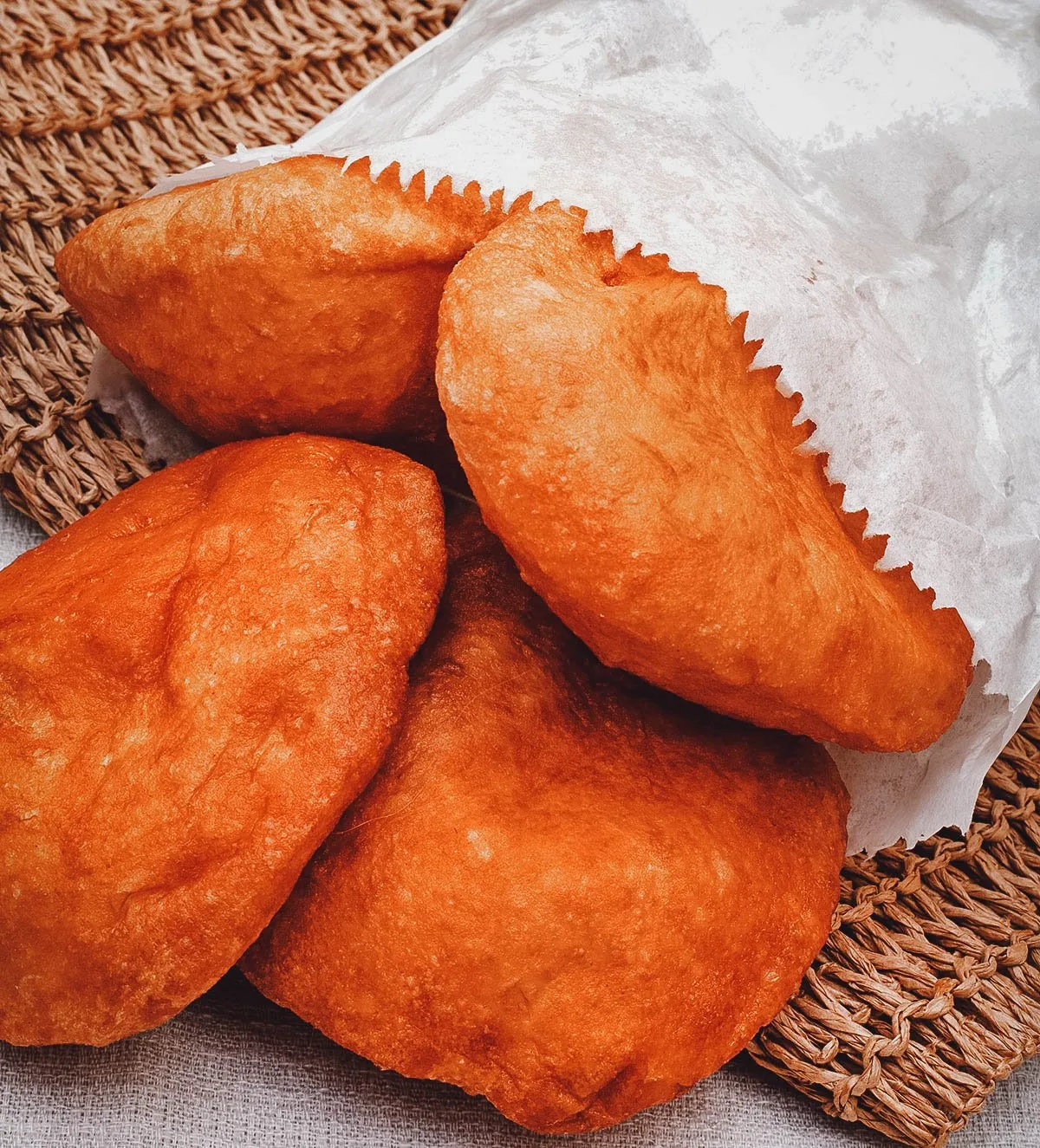 Types of Donuts From Around the World Vetkoek donuts in a bag