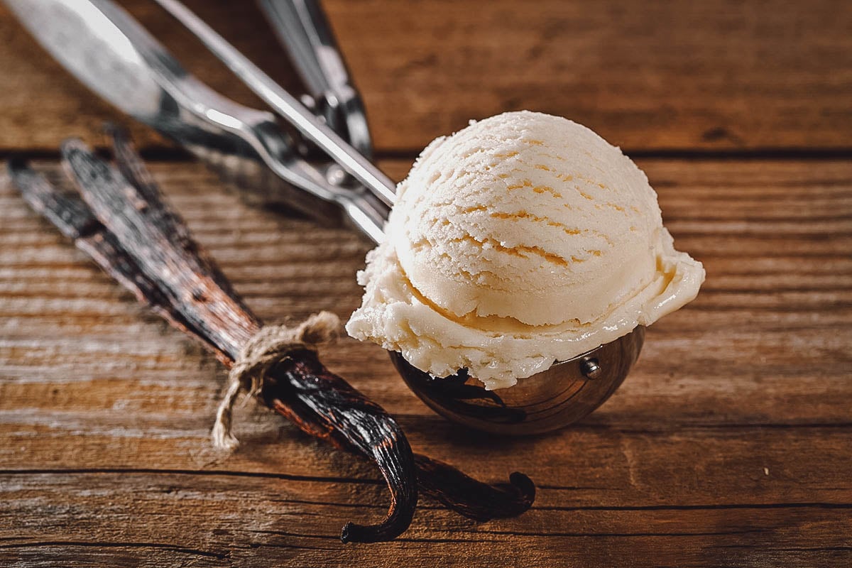 Scoop of ice cream and vanilla beans