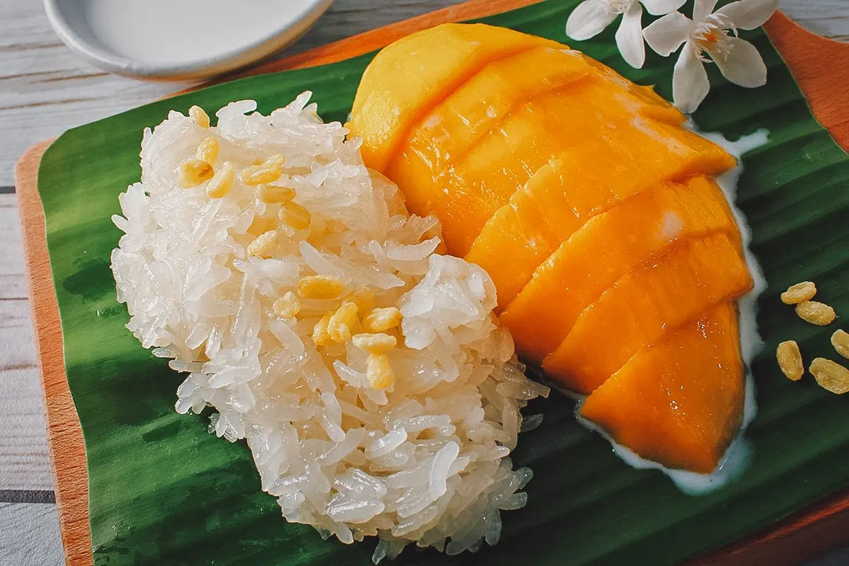 Mango sticky rice soaked in coconut milk