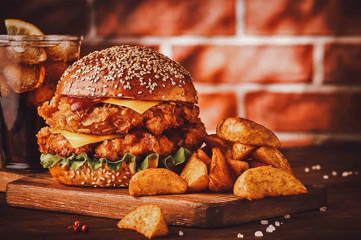 Chicken burger with potato wedges