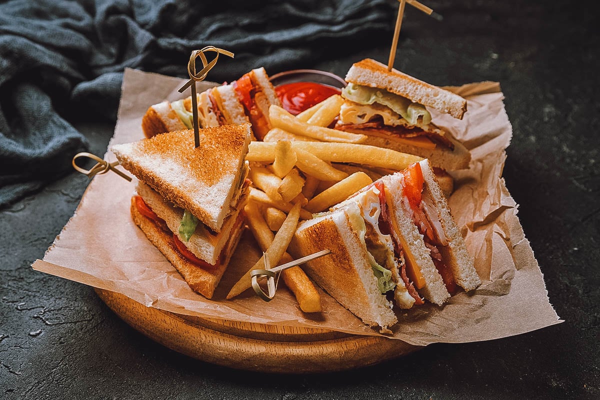 Classic club sandwich with french fries