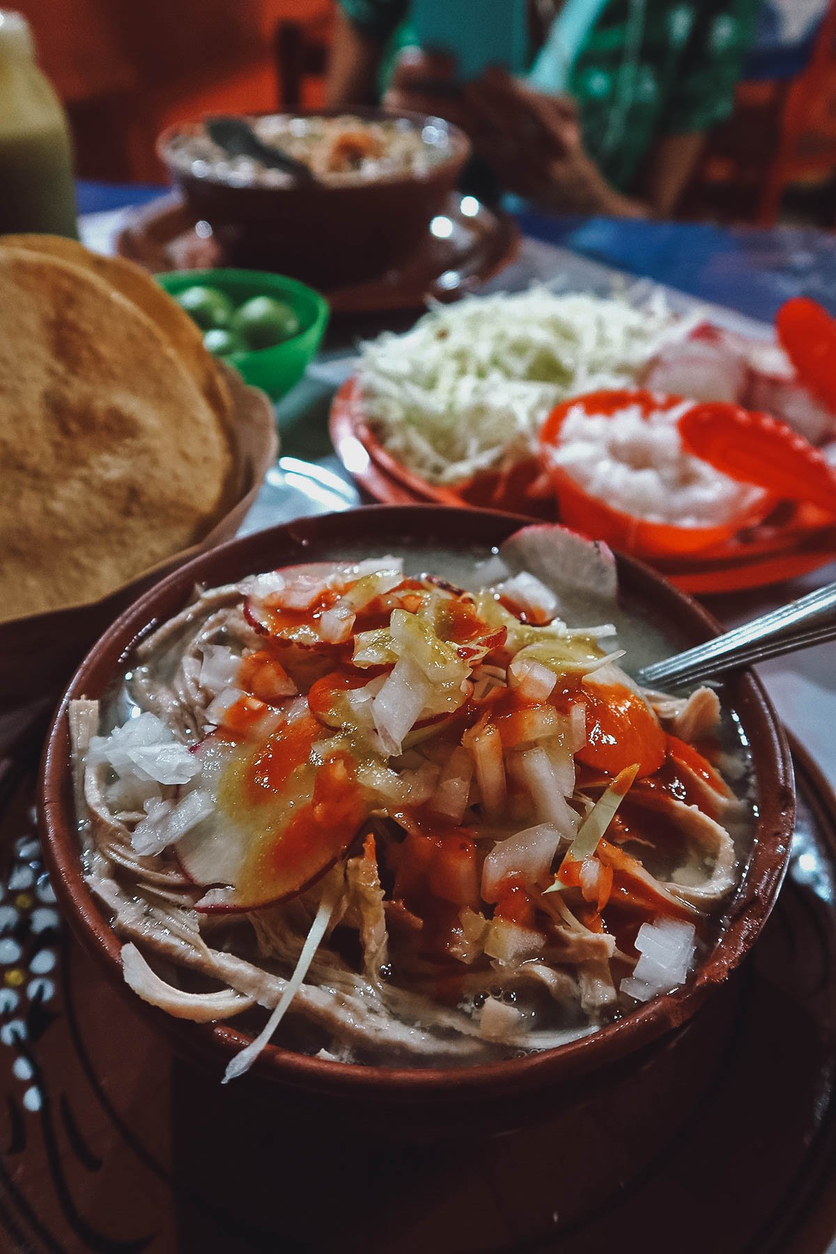 Pozole blanco with condiments at Los Picapiedra in Queretaro