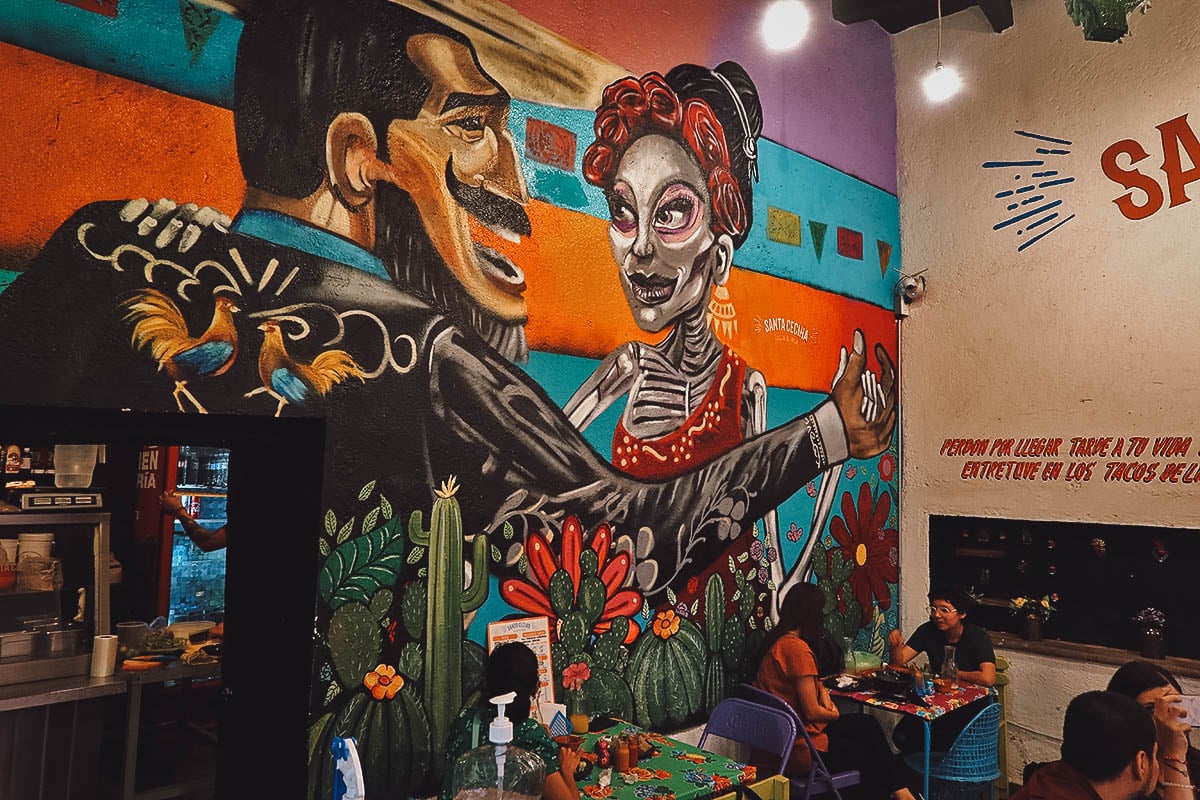 Colorful mural inside Santa Cecina restaurant in Queretaro