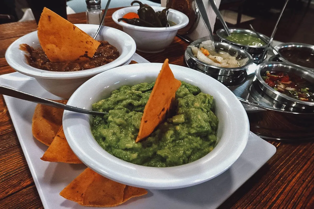 Guacamole and refried beans at Carnitas Don Raul