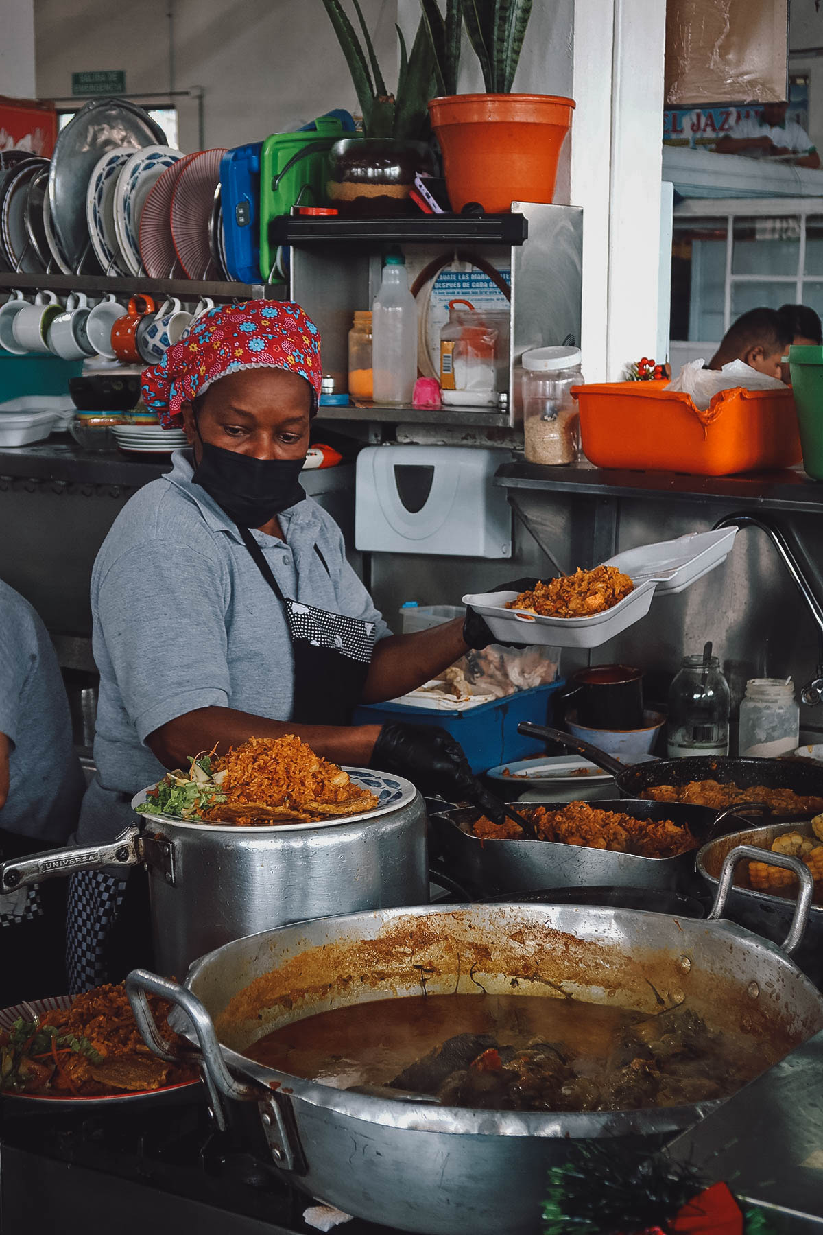 Cook at a market in Bogota, Colombia