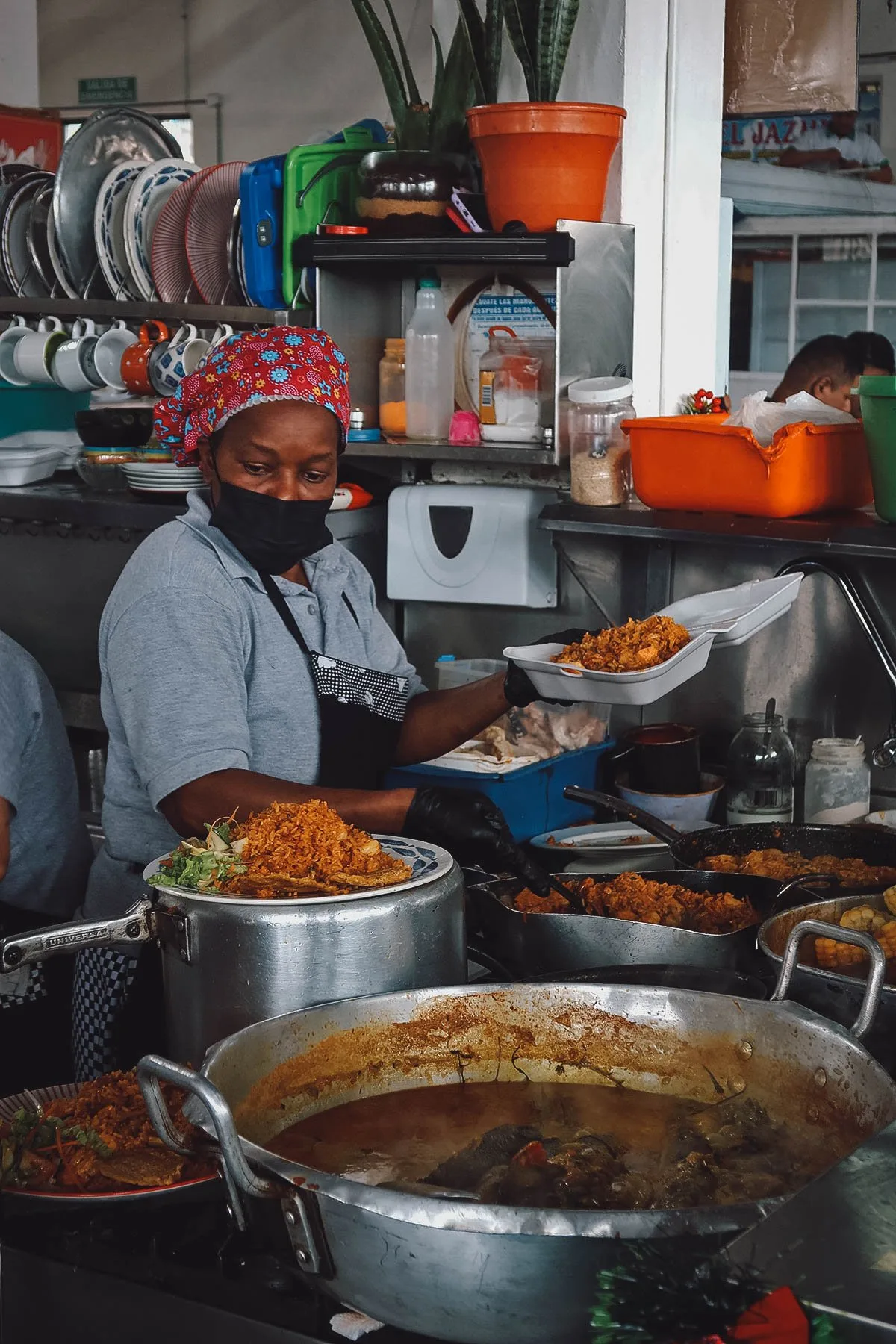 Cook at a market in Bogota, Colombia