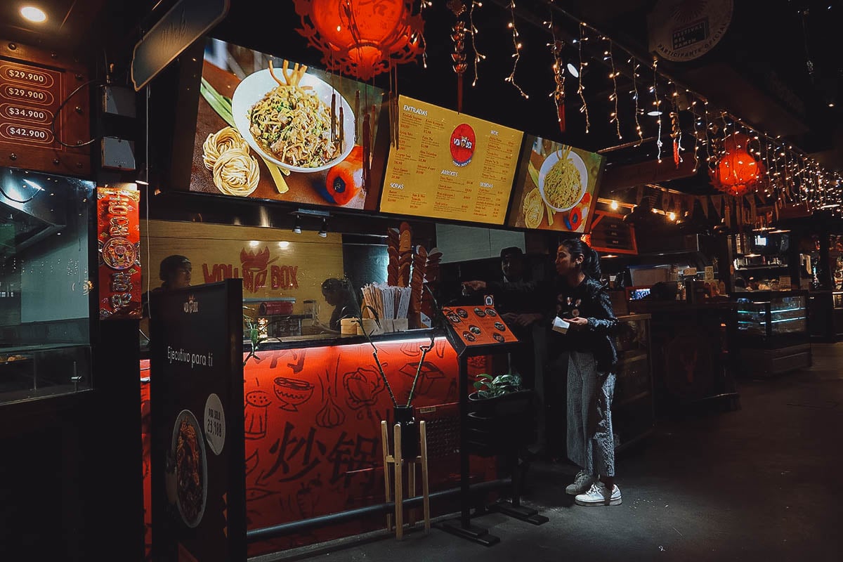 Wok in a Box stall at Mercado del Rio in Medellin, Colombia