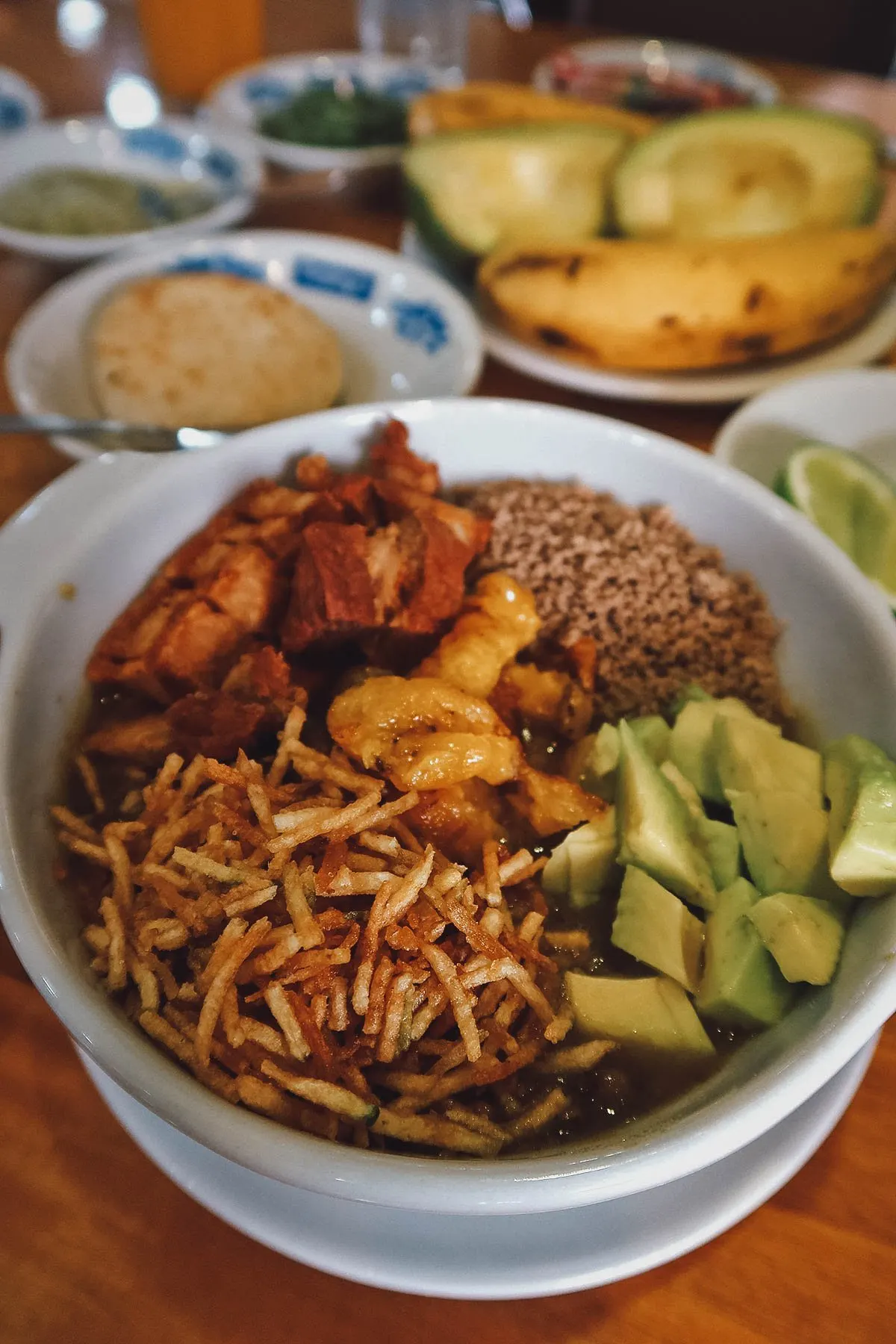 Bowl of cazuela de lentejas at Mondongo's restaurant in Medellin