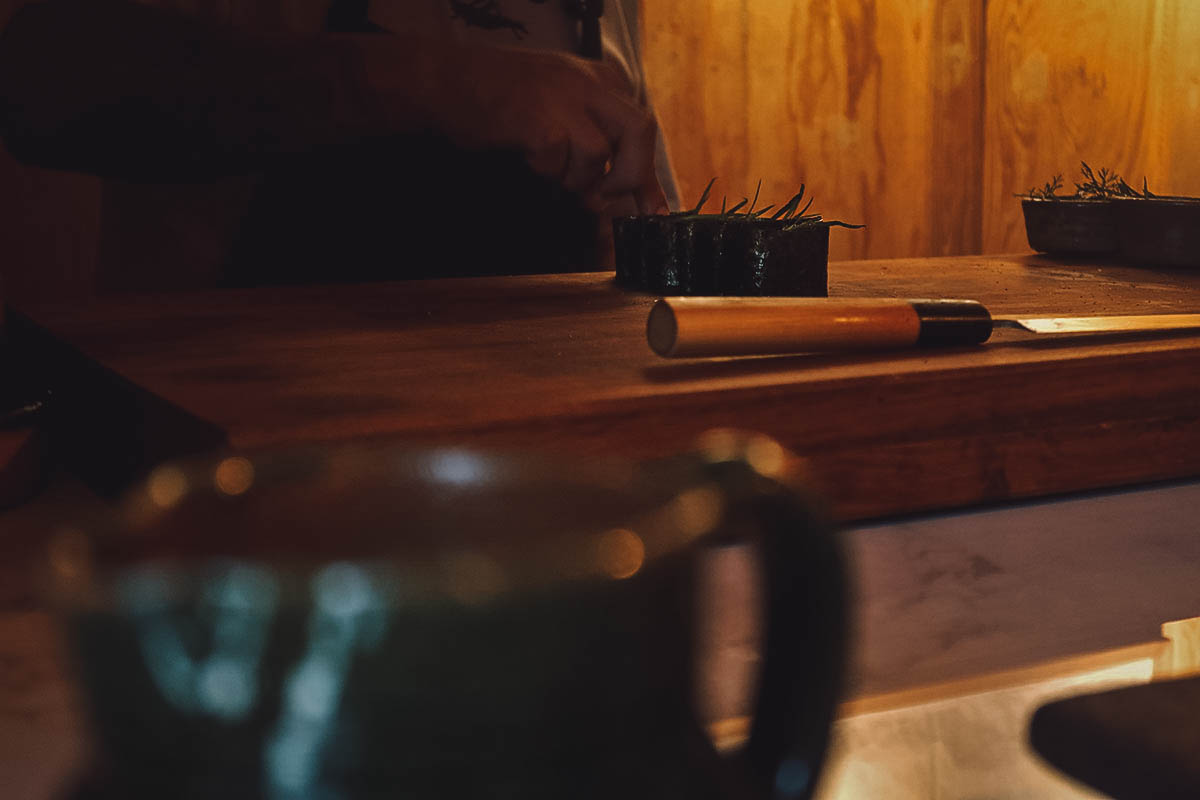 Chef preparing the next course at Crudo restaurant in Oaxaca, Mexico