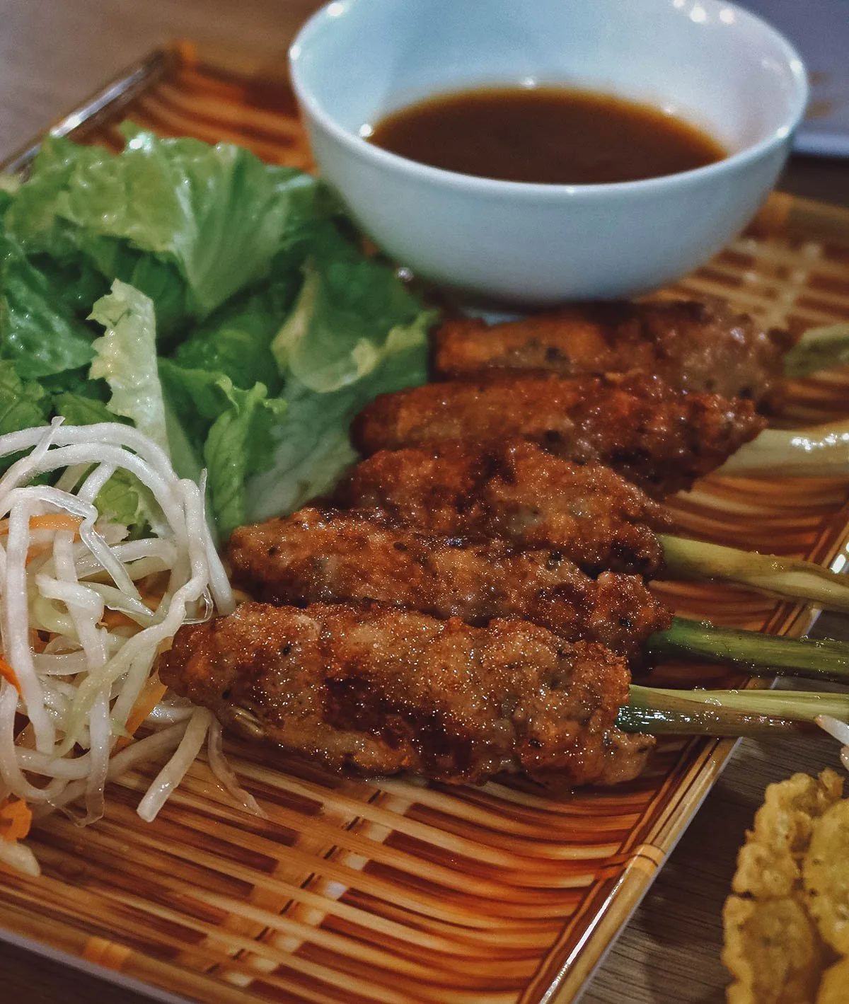 Must-Eat Restaurants & Street Food Stalls in Hue, Vietnam Nem lui at Cozy restaurant in Hue, Vietnam