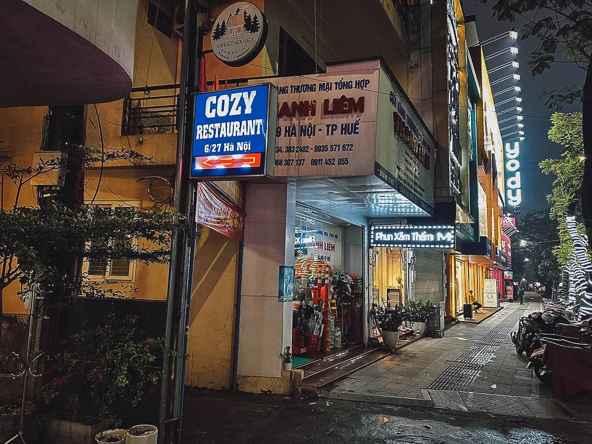 Cozy restaurant sign in Hue, Vietnam