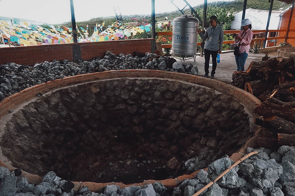 Roasting pit at Mezcal Don Agave in Oaxaca, Mexico