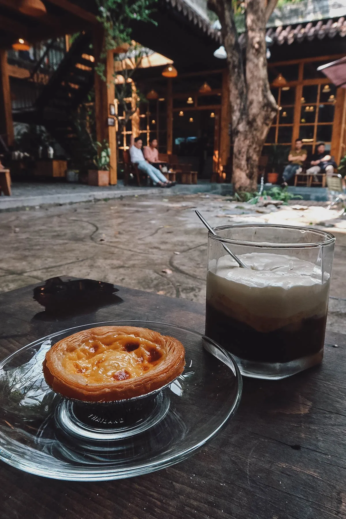 Salt coffee and a pastry at a cafe in Danang, Vietnam