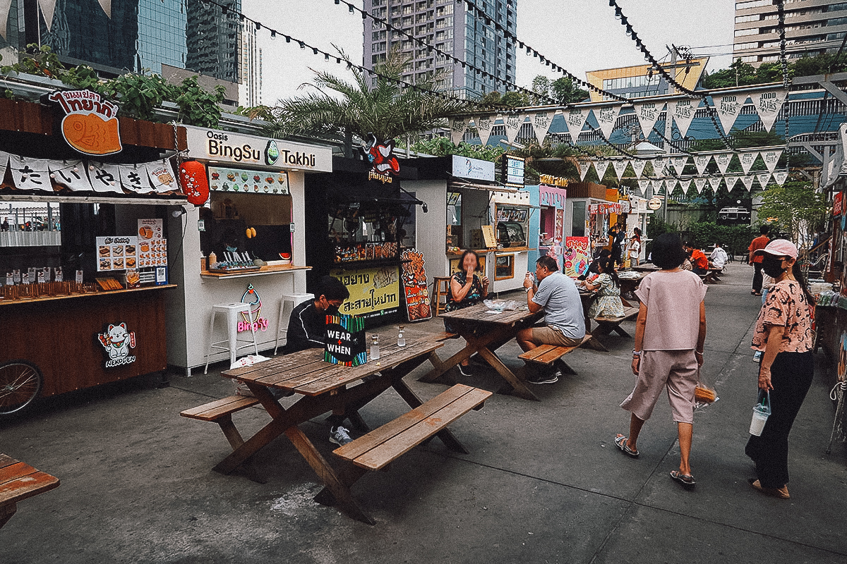 Dining tables at Jodd Fairs night market in Bangkok