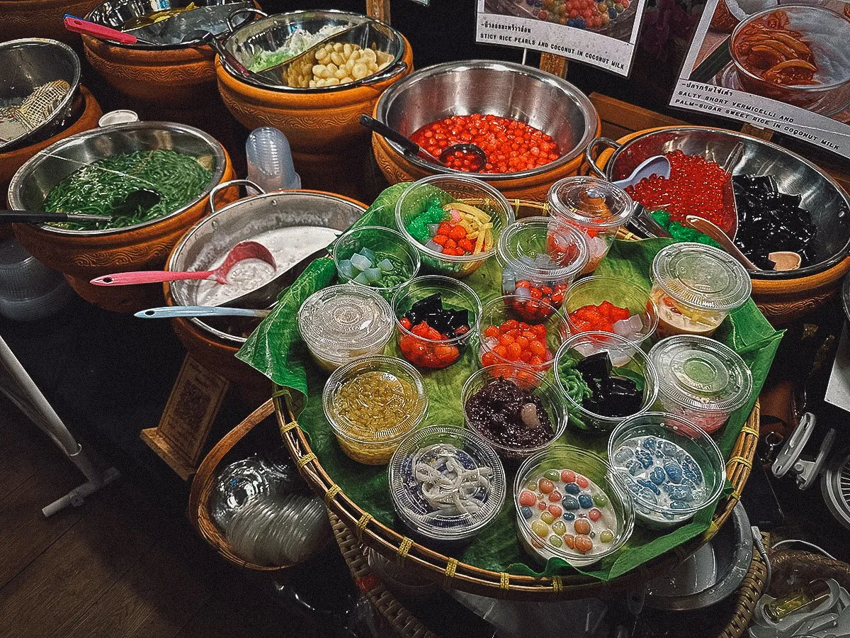 Thai desserts for sale at Sooksiam floating market in Bangkok