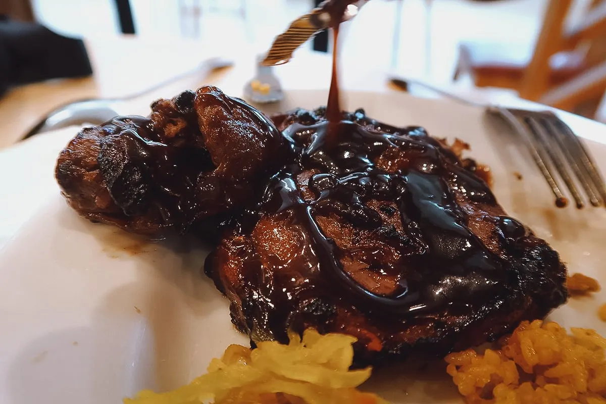 The Best Restaurants in Manila Dripping java sauce on the barbecued chicken