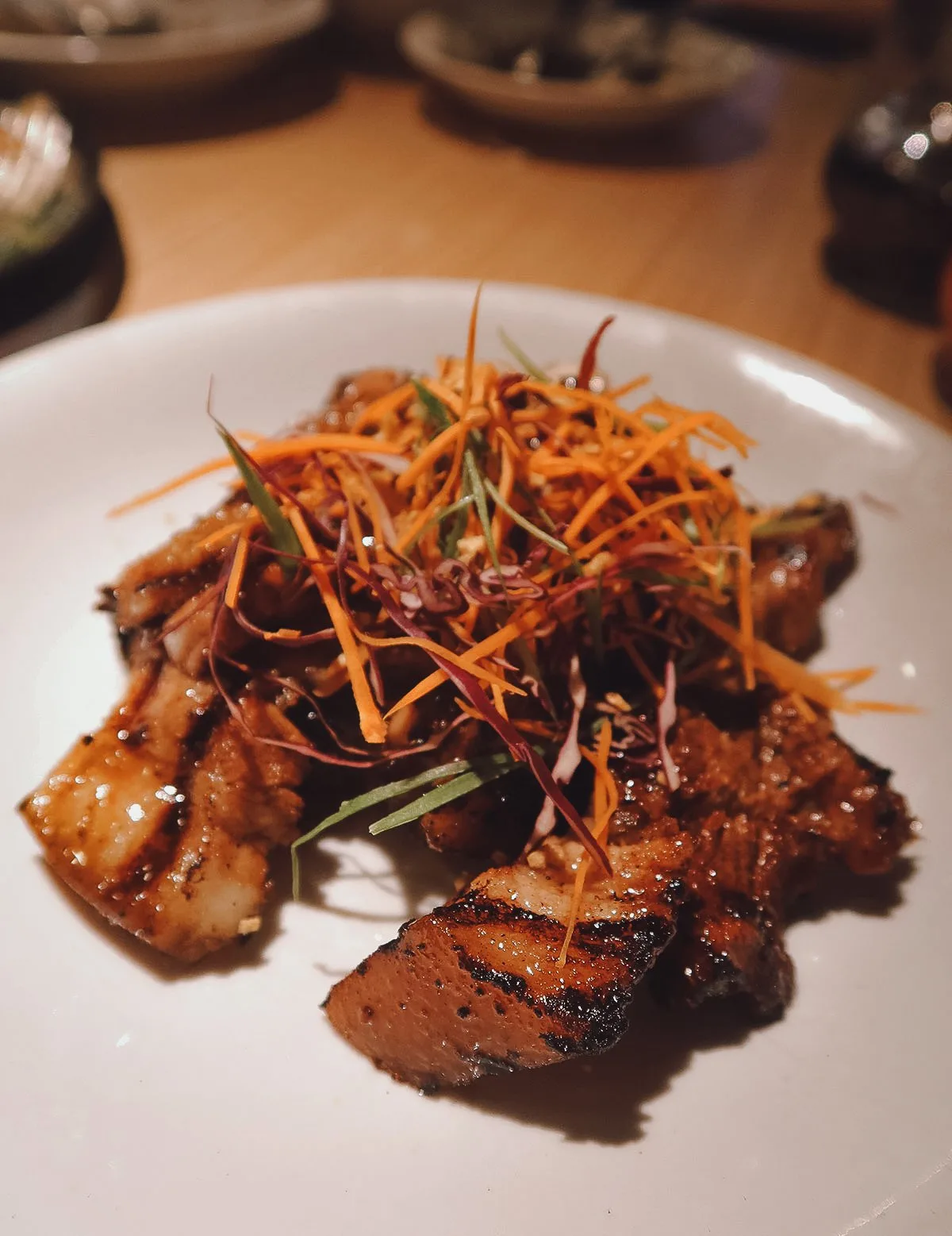 The Best Restaurants in Manila Grilled pork at a restaurant in Metro Manila
