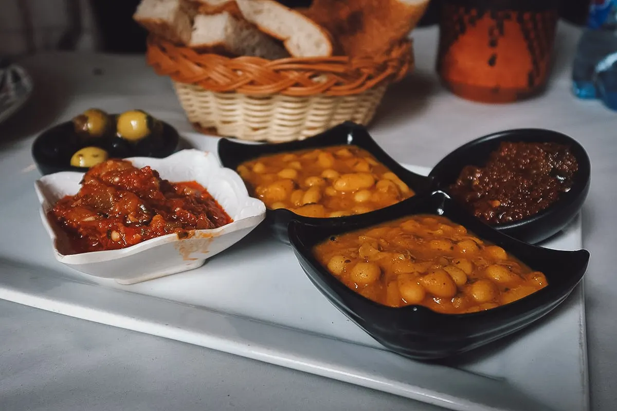 Bean stew and zaalouk at a restaurant in Tangier