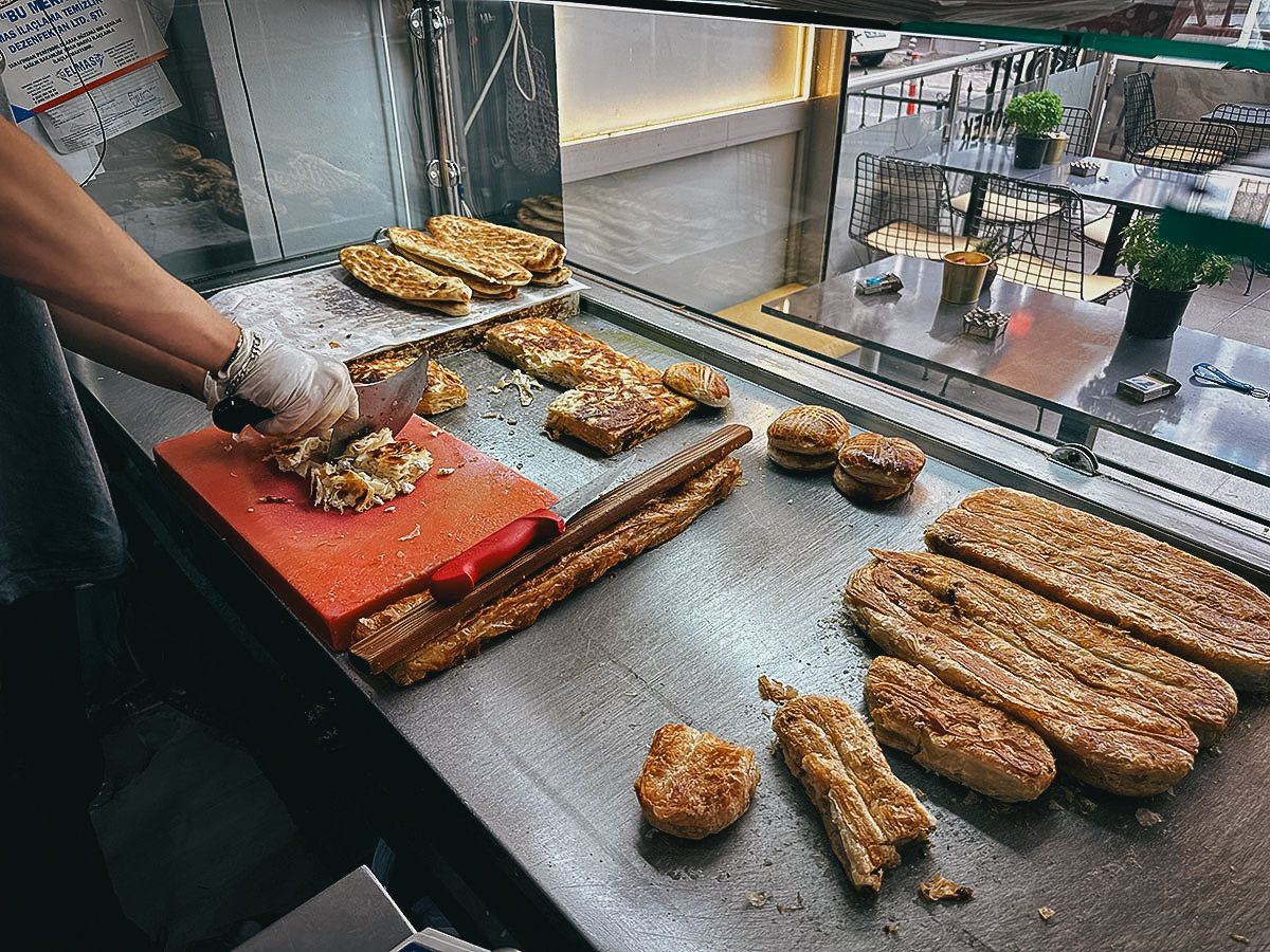 Vendor cutting borek in Istanbul