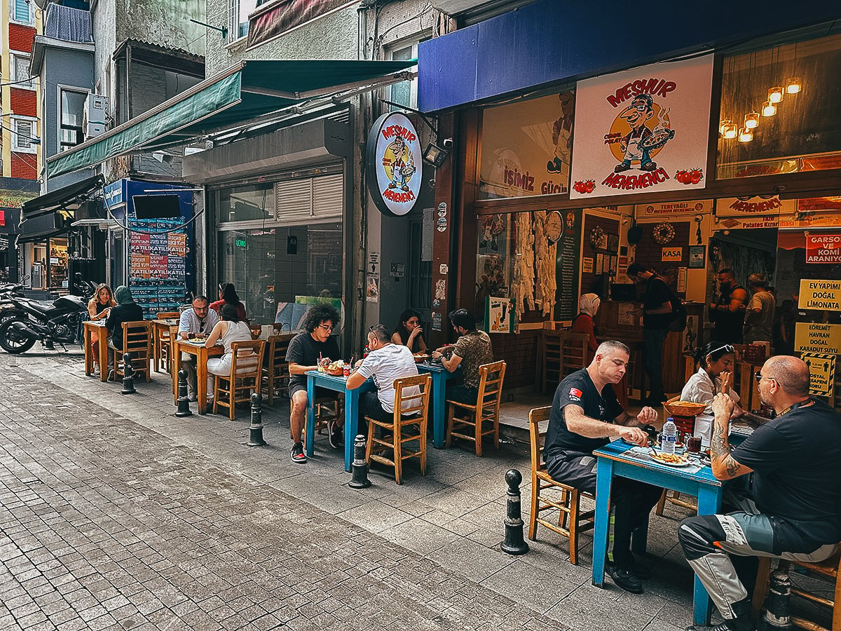 Meshur Menemenci at a restaurant in Istanbul