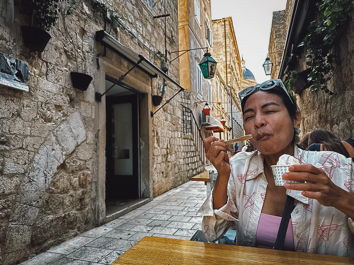 Woman enjoying gelato in Dubrovnik