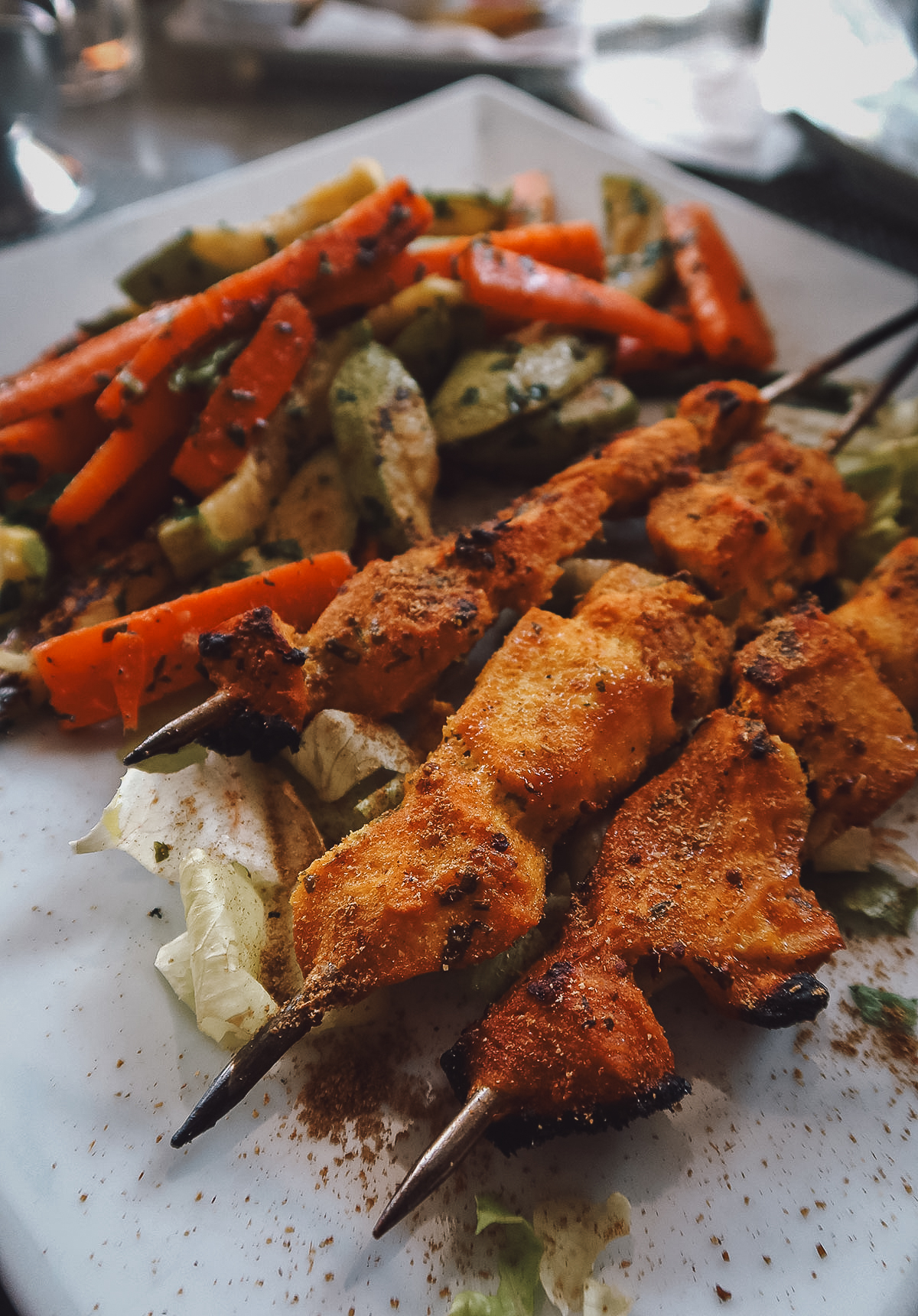 Grilled chicken skewers at a restaurant in Marrakech