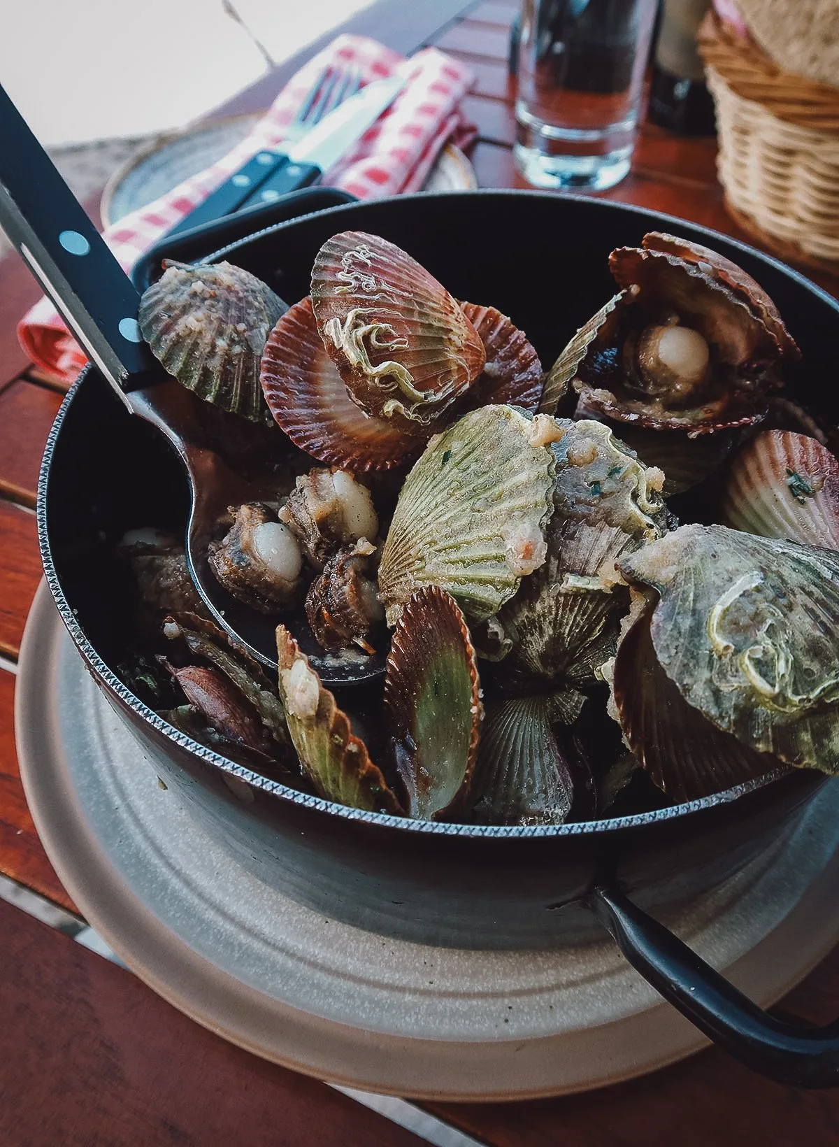 Scallops buzara at a restaurant in Rovinj