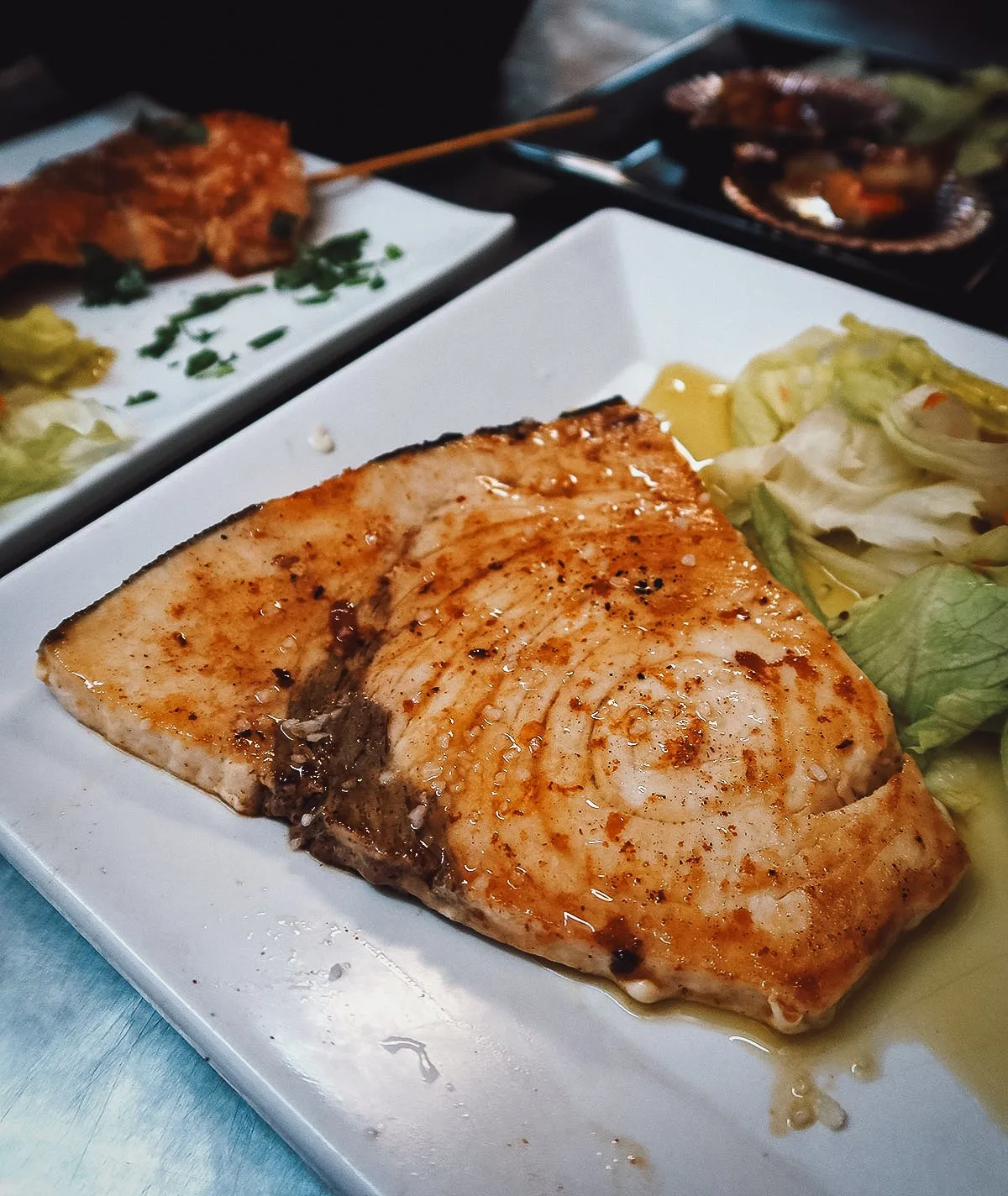 Grilled swordfish at a restaurant in Seville