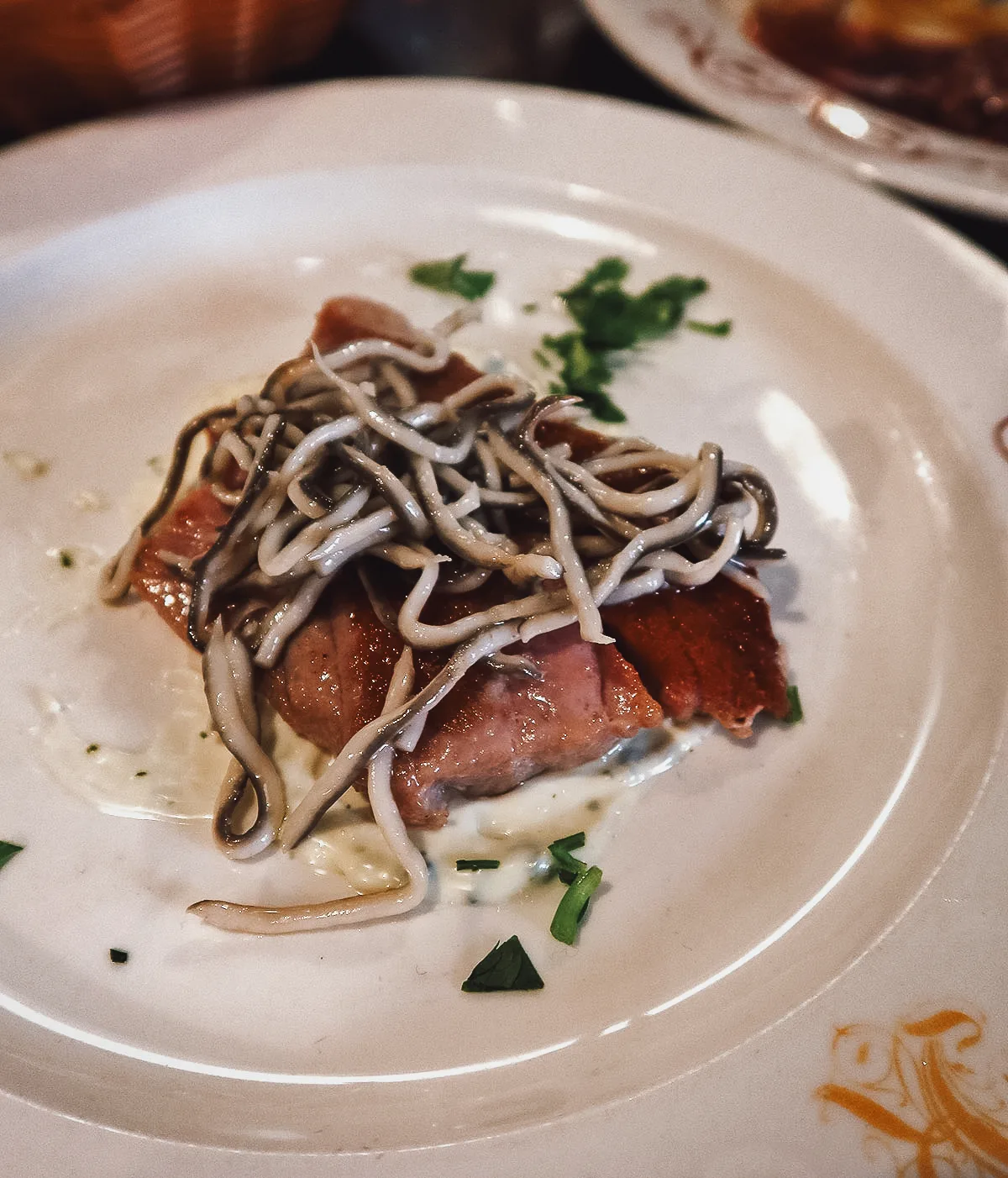 Tuna with angulas at a restaurant in Seville