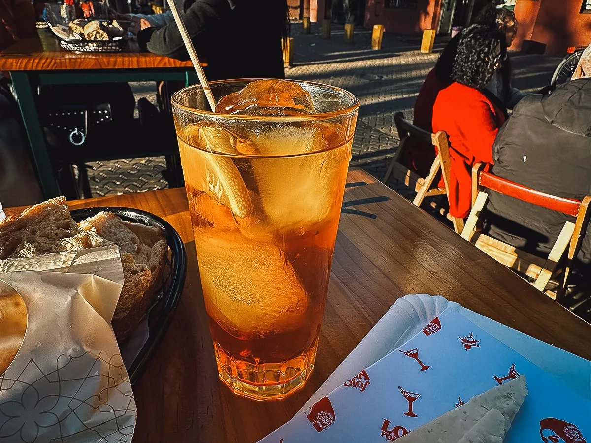 Orange vermut at a restaurant in Seville