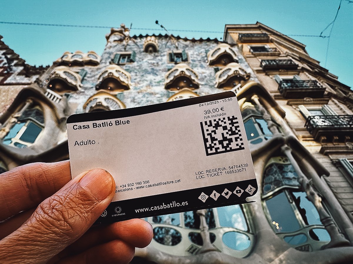 Holding ticket in front of Casa Batllo