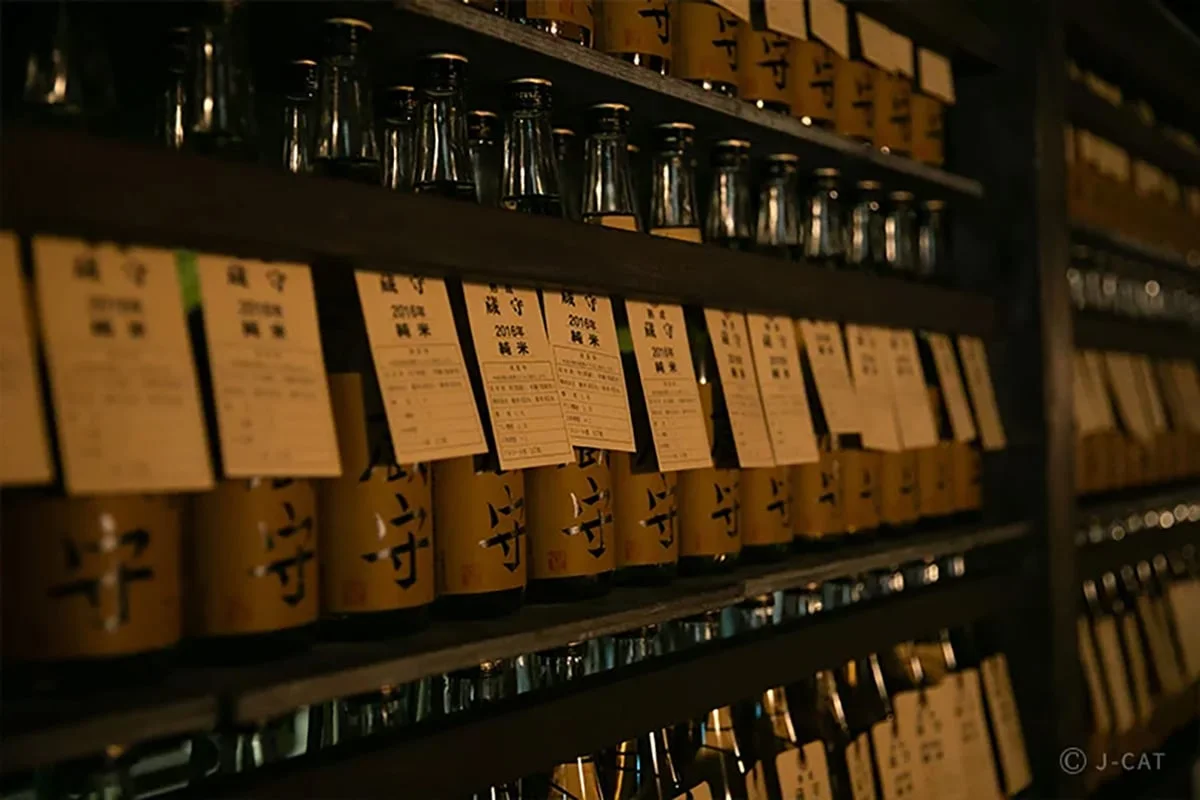 Luxe Culinary Experiences in Tokyo Sake bottles at a brewery