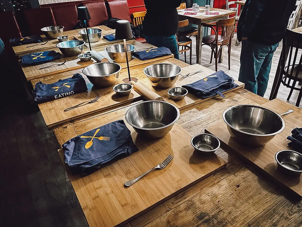 Pasta Cooking Class in Rome Pasta making setup inside a restaurant in Rome