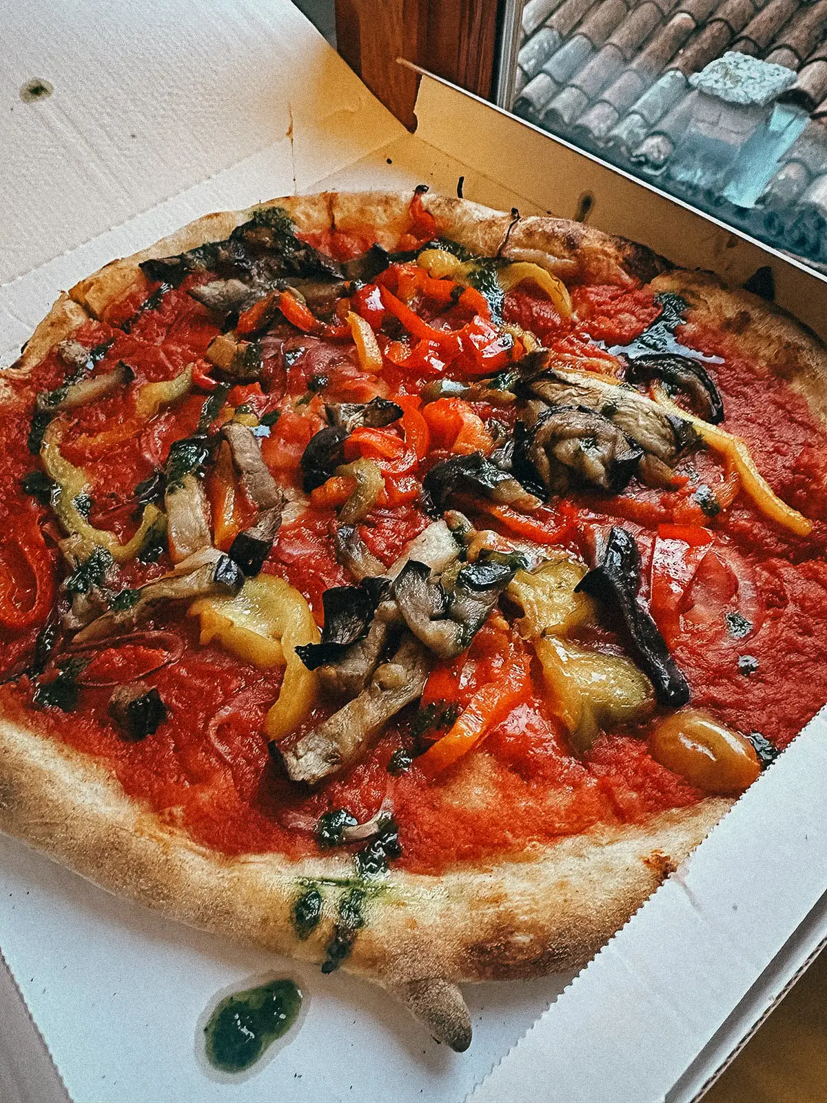 Locally-Recommended Restaurants in Venice, Italy Whole thin crust pizza in a box