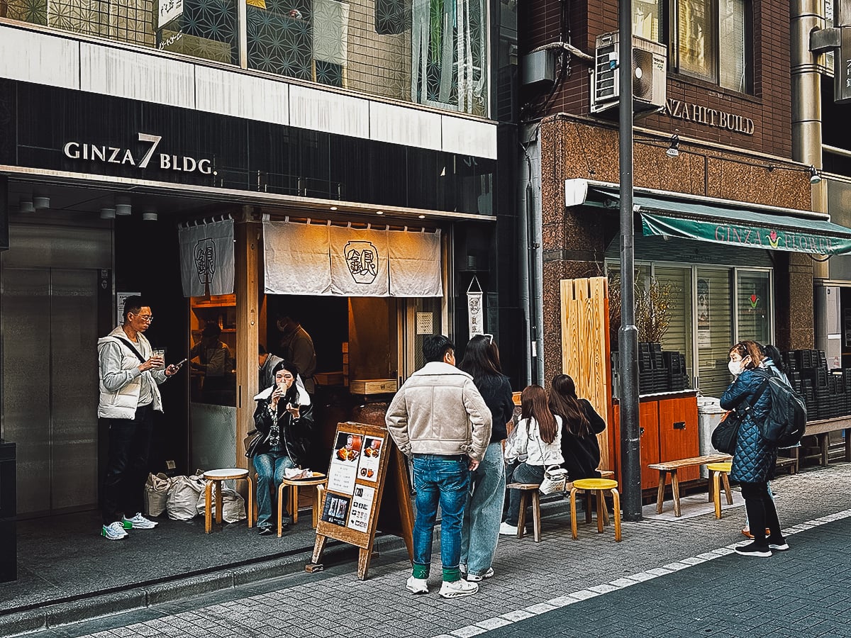 Customers eating sweet potatoes at Tsubo-Yakiimo