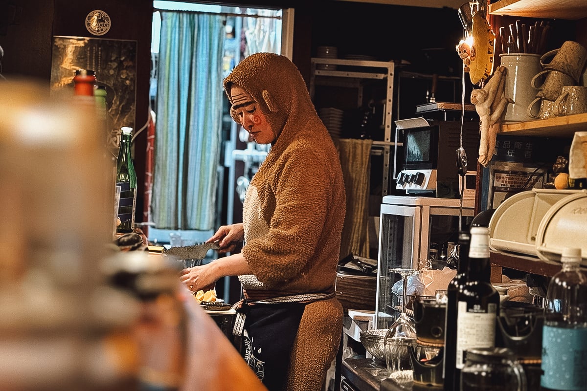 Veganic Monkey Magic Chef Monkey-san prepping a dish