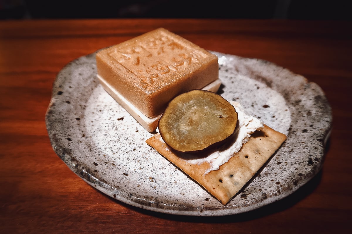 Veganic Monkey Magic Monaka and fried sweet potato on a cracker