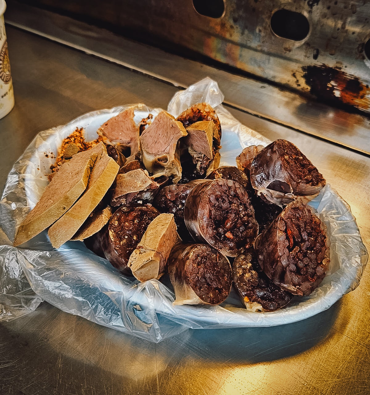 Sinchon and Hongdae Food Guide Sundae with extra pieces of meat
